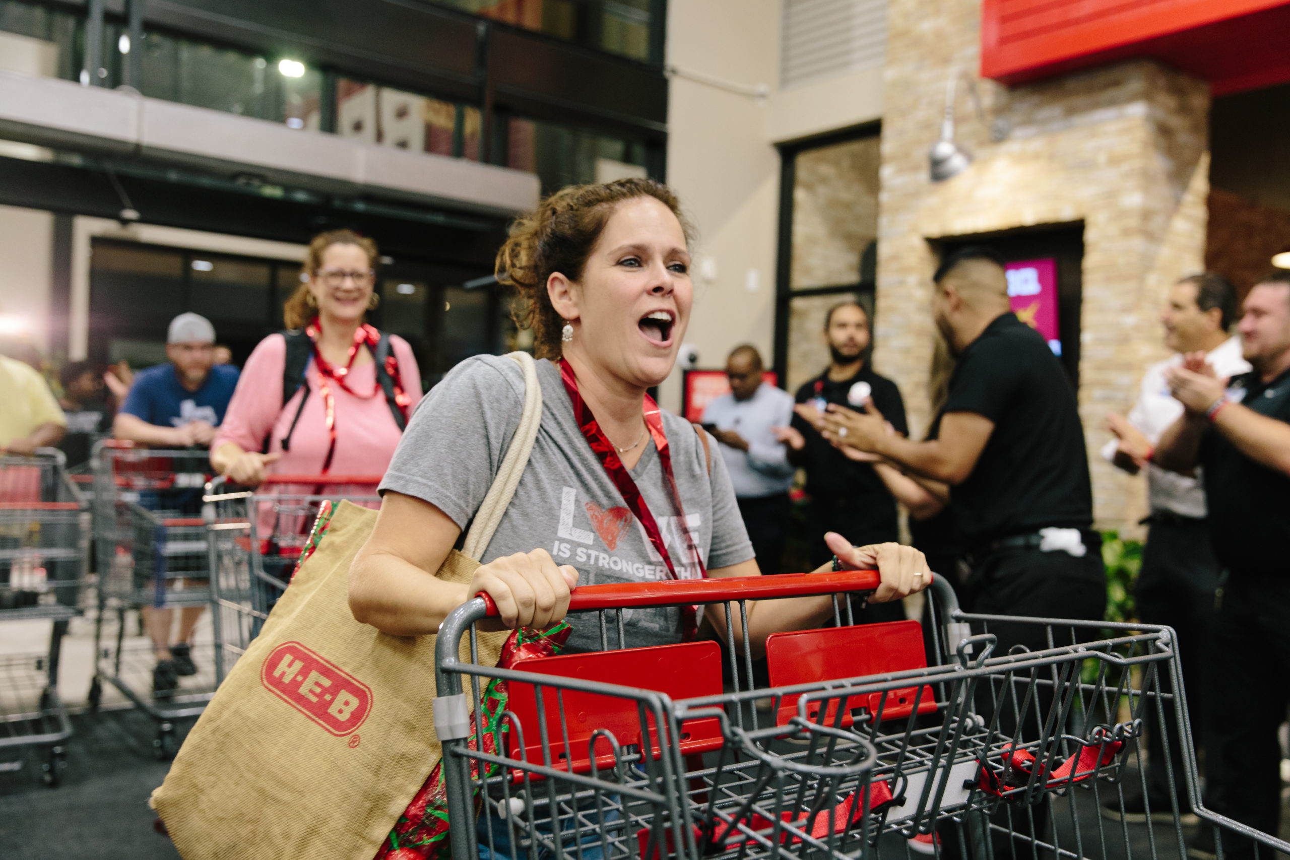 H-E-B shoppers wait in line for Frisco store's opening