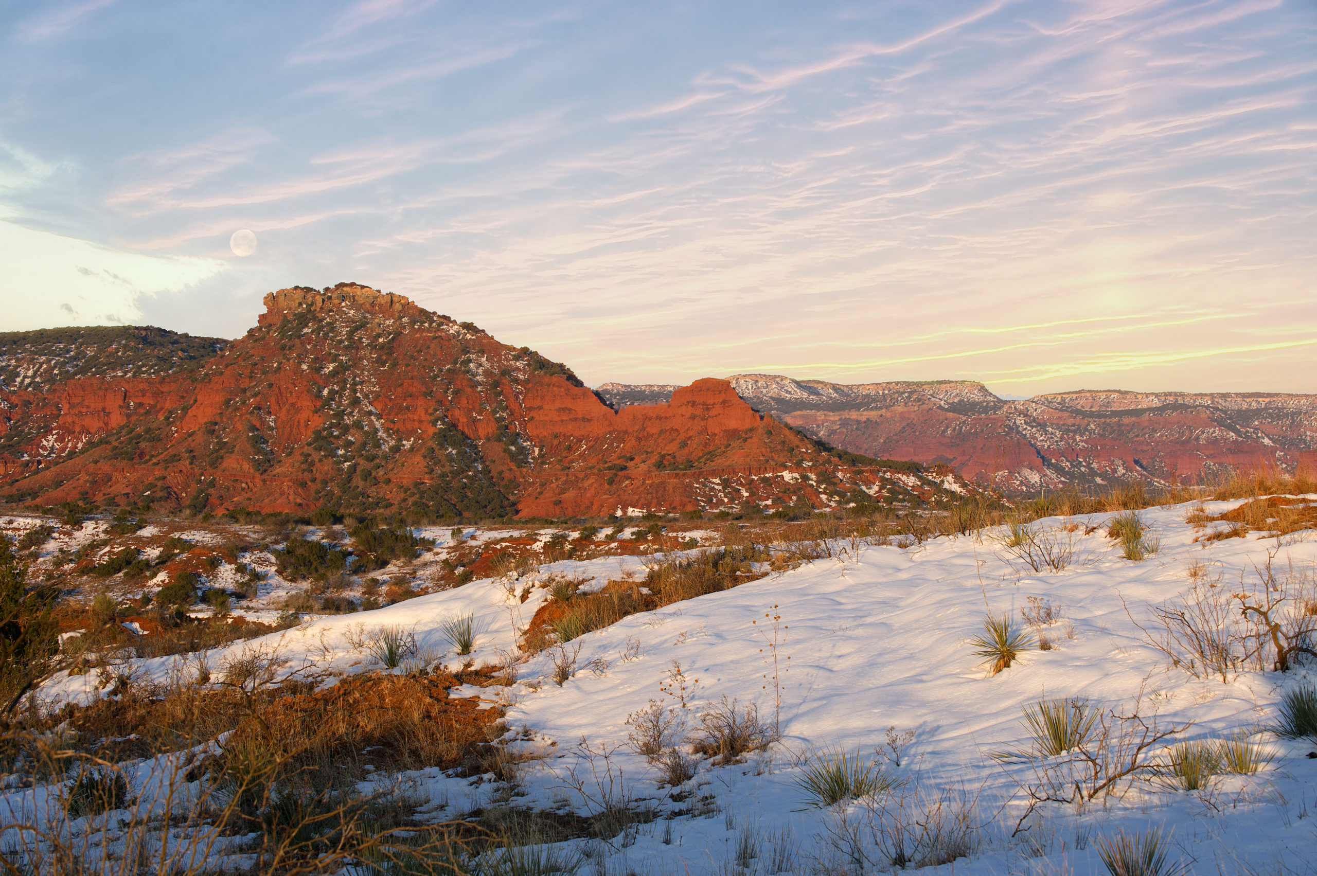 SUNRISE AT CAPROCK CANYONS STATE PARK AFTER A RECENT SNOW.
